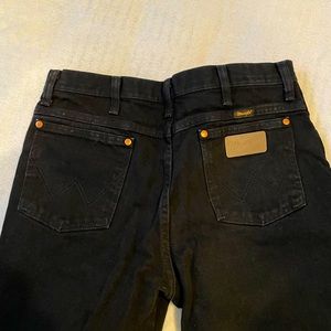 Black Wrangler 936WBK black jeans in good condition, even coloring. No fades.